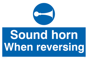 Sound horn when reversing sign 