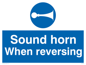 Sound horn when reversing sign 
