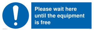Please wait here until the equipment is free sign 