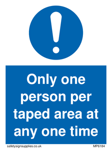 Only one person per taped area at any one time sign 