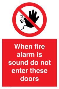 When fire alarm is sound do not enter these doors Prohibition Sign 