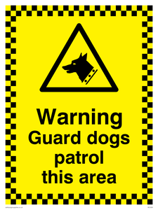 warning guard dogs patrol this area