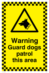 warning guard dogs patrol this area
