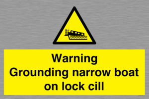 Warning Grounding narrow boat on lock cill