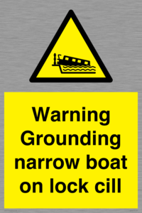 Warning Grounding narrow boat on lock cill