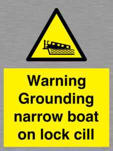 Warning Grounding narrow boat on lock cill
