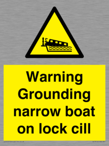 Warning Grounding narrow boat on lock cill