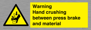 Warning Hand crushing between press brake and material