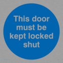 this-door-must-be-kept-locked-shut-in-blue-circle~