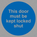 this-door-must-be-kept-locked-shut-in-blue-circle~