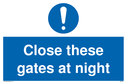 close-these-gates-at-night-sign-~