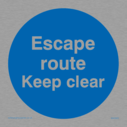 escape-route-keep-clear-in-blue-circle~