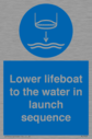 lower-lifeboat-to-the-water-in-launch-sequence~