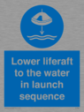 lower-liferaft-to-the-water-in-launch-sequence~