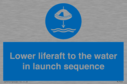 lower-liferaft-to-the-water-in-launch-sequence~