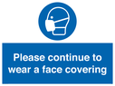 please-continue-to-wear-a-face-covering~