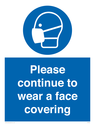 please-continue-to-wear-a-face-covering~