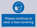 please-continue-to-wear-a-face-covering~