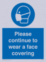 please-continue-to-wear-a-face-covering~