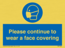 please-continue-to-wear-a-face-covering~