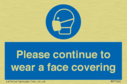 please-continue-to-wear-a-face-covering~