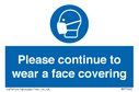 please-continue-to-wear-a-face-covering~