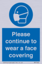 please-continue-to-wear-a-face-covering~