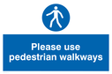 use-pedestrian-walkways-sign-~