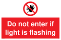 do-not-enter-if-light-is-flashing-sign-~