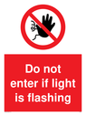do-not-enter-if-light-is-flashing-sign-~