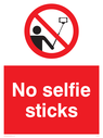 no-selfie-sticks-sign-~