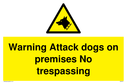 warning-attack-dogs-sign-~