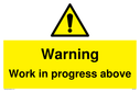 warning-work-in-progress-above-sign-~