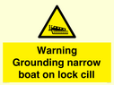 warning-grounding-narrow-boat-on-lock-cill~