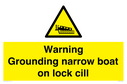 warning-grounding-narrow-boat-on-lock-cill~
