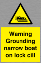 warning-grounding-narrow-boat-on-lock-cill~