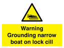 warning-grounding-narrow-boat-on-lock-cill~