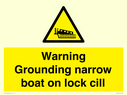 warning-grounding-narrow-boat-on-lock-cill~