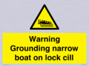 warning-grounding-narrow-boat-on-lock-cill~
