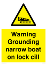 warning-grounding-narrow-boat-on-lock-cill~