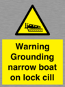 warning-grounding-narrow-boat-on-lock-cill~