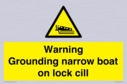 warning-grounding-narrow-boat-on-lock-cill~