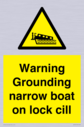 warning-grounding-narrow-boat-on-lock-cill~