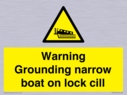 warning-grounding-narrow-boat-on-lock-cill~