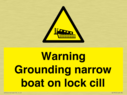 warning-grounding-narrow-boat-on-lock-cill~