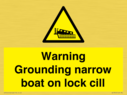 warning-grounding-narrow-boat-on-lock-cill~