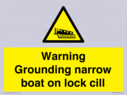warning-grounding-narrow-boat-on-lock-cill~