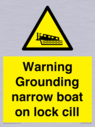 warning-grounding-narrow-boat-on-lock-cill~