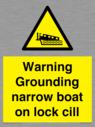 warning-grounding-narrow-boat-on-lock-cill~