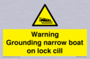 warning-grounding-narrow-boat-on-lock-cill~